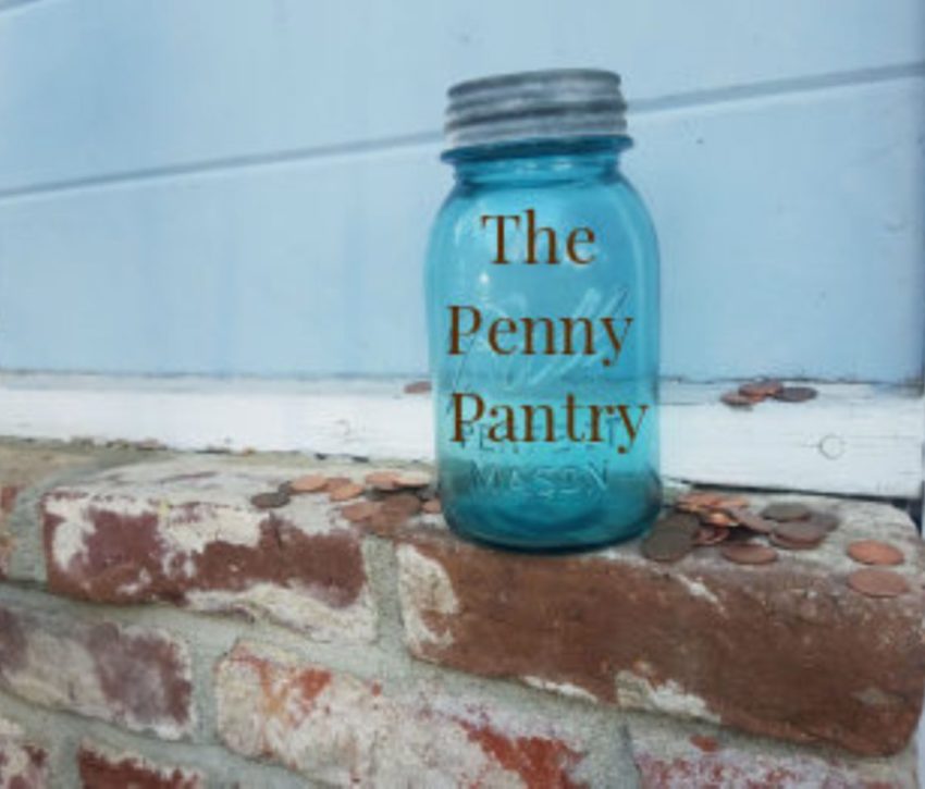 Blue mason jar that says "The Penny Pantry"