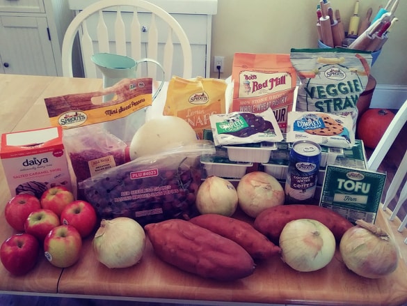 Sprouts shopping trip includes sweet potatoes, onions, tofu, Lenny & Larry cookies, grapes, Daiya ice cream bars, Sprouts veggie straws, Bob's Red Mill flour