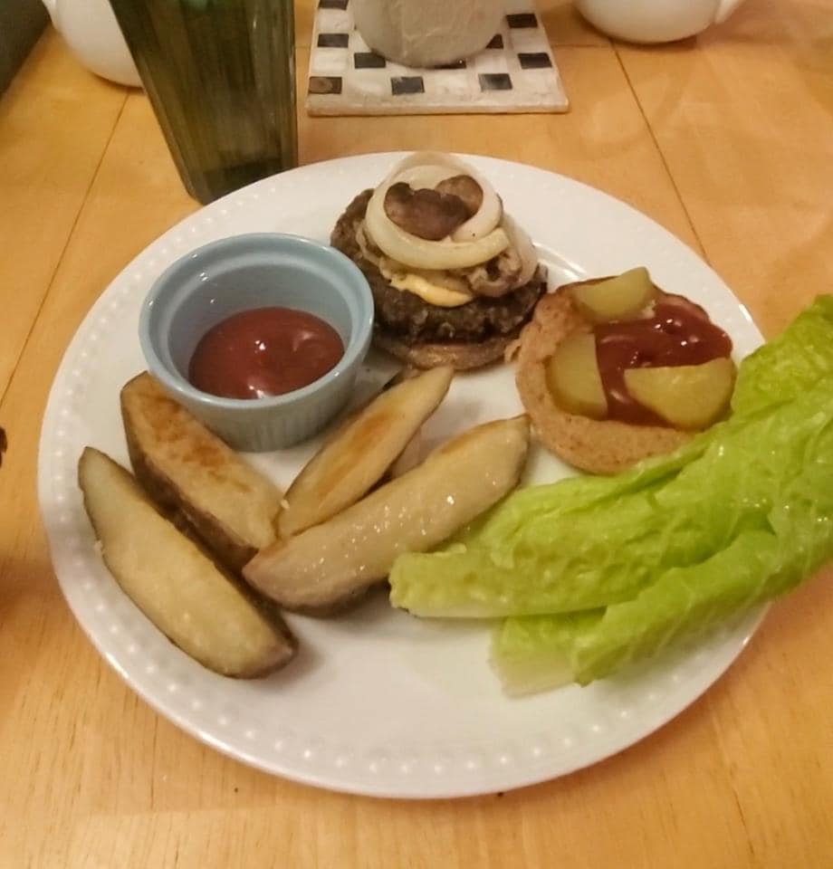 homemade vegan gardenburger sliders  on a plate with homemade baked fries