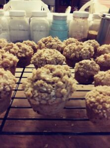 Banana streusel vegan muffins cooling on rack
