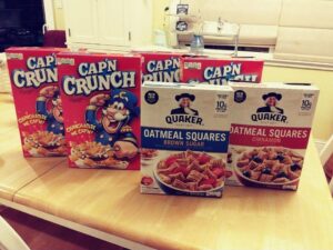 Boxes of Cap'n Crunch and Oatmeal Squares Cereal