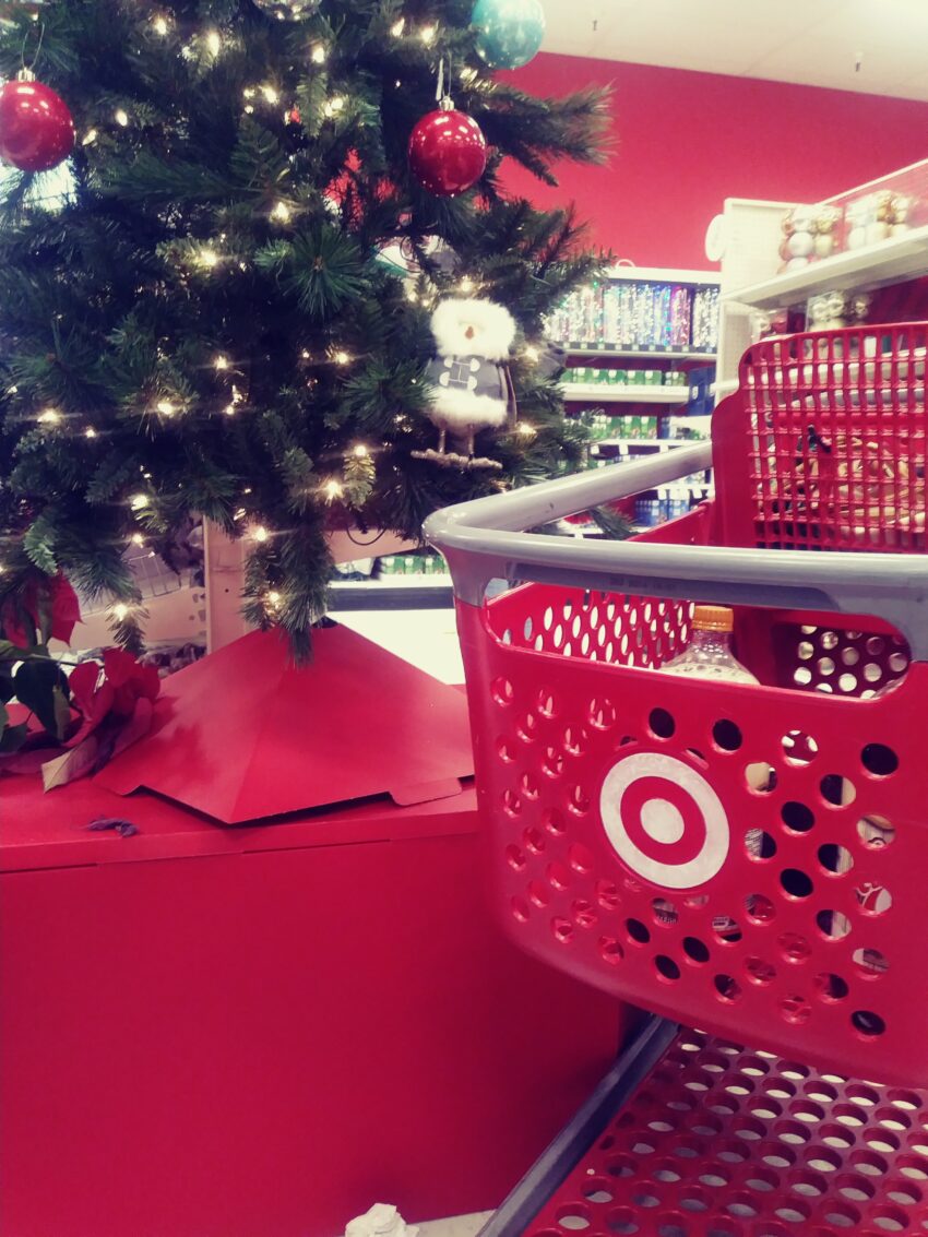 Target Christmas Cart with Christmas tree behind it