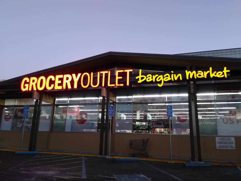 Grocery Outlet storefront at night