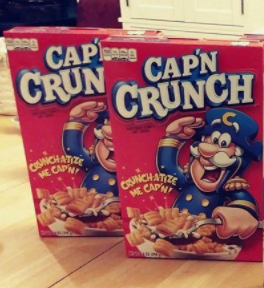 Two boxes of Quaker Cap'n Crunch Cereal