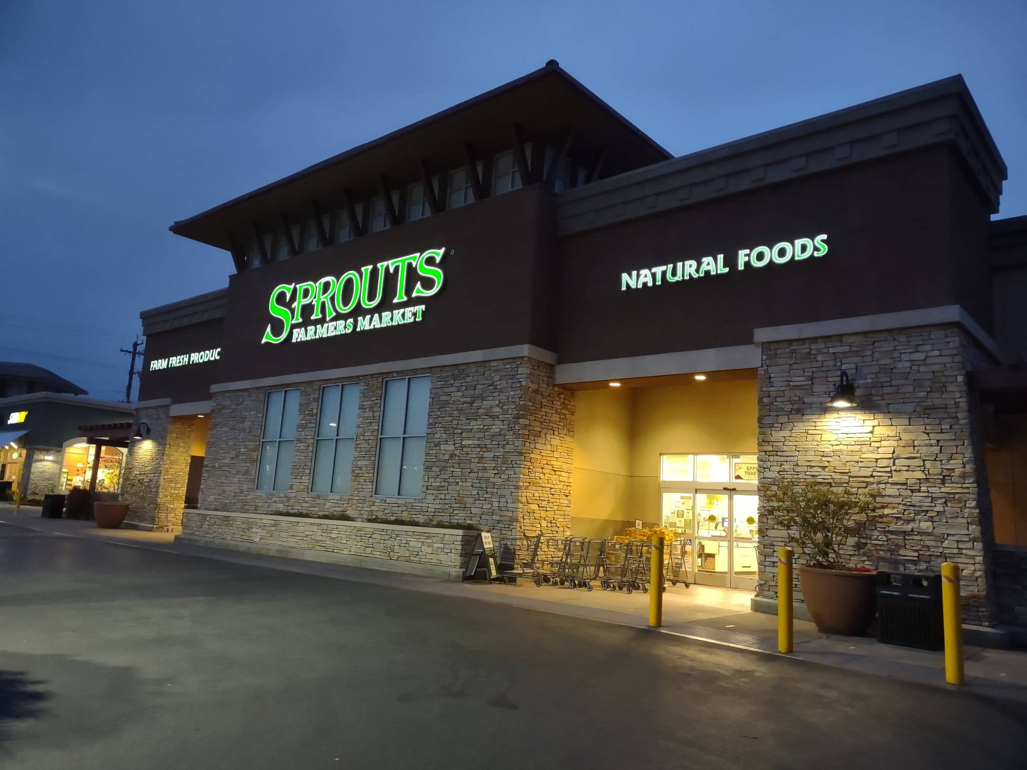 Sprouts storefront at night