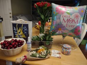 My Mother's Day Gifts: flowers, balloon, cherries, face spary, succulents and a candle