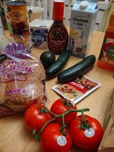 Safeway Trip including tomatoes, cucumbers, hamburger buns, Chobani oatmilk
