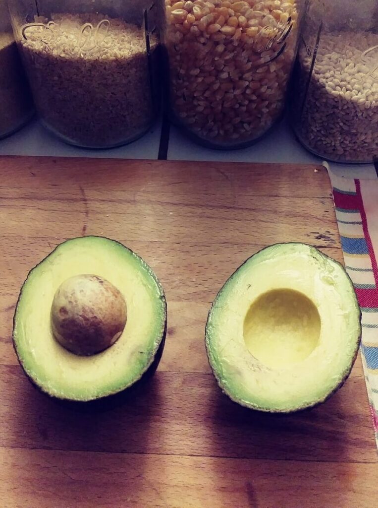 Avocado cut open halves