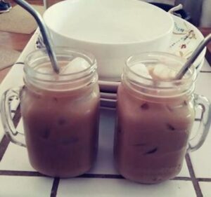 Iced coffee in mason jar cups