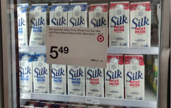 display case with Silk Next Milk marked $5.49