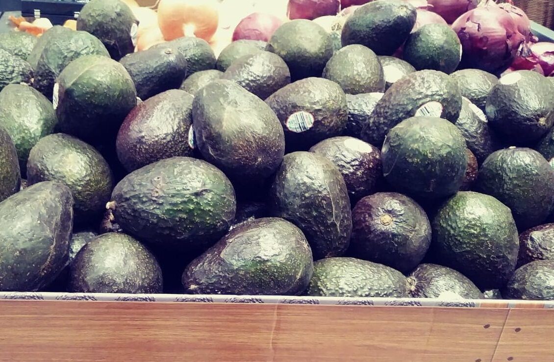 bin of avocados from Mexico