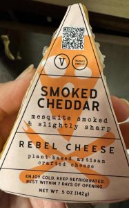 wedge of Rebel cheese smoked cheddar