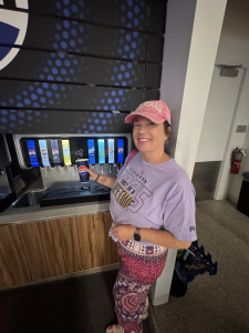 Me getting soda at the soda machine at the Chase Center