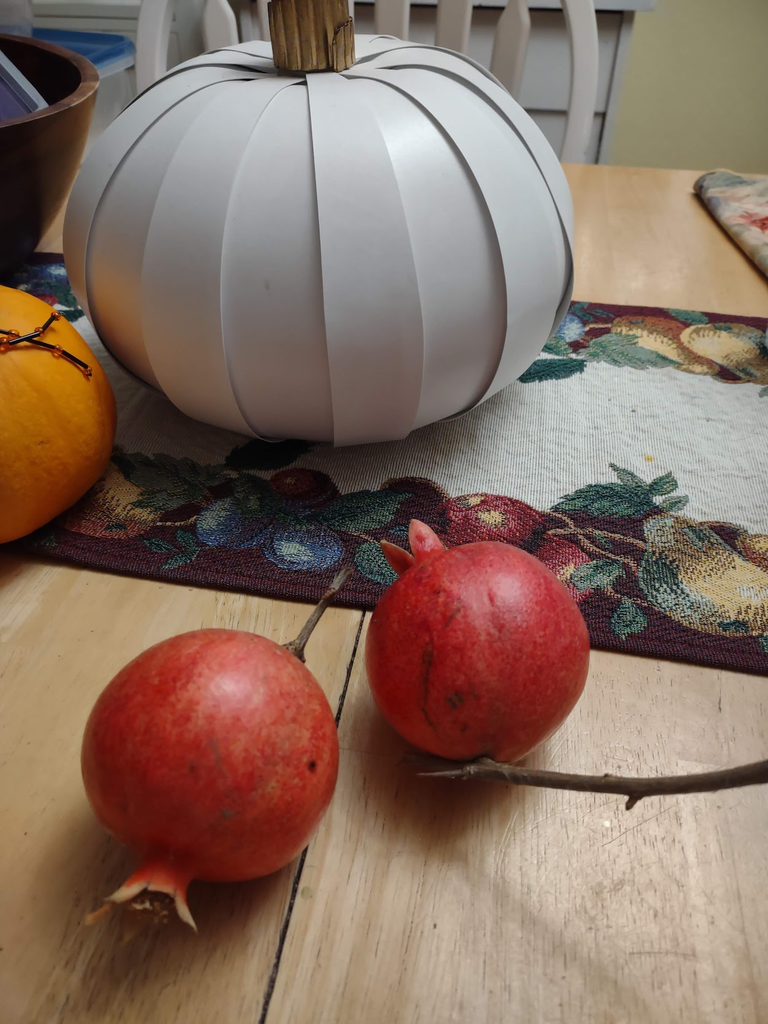 Two Pomegranates and a White Pumpkin Decoration