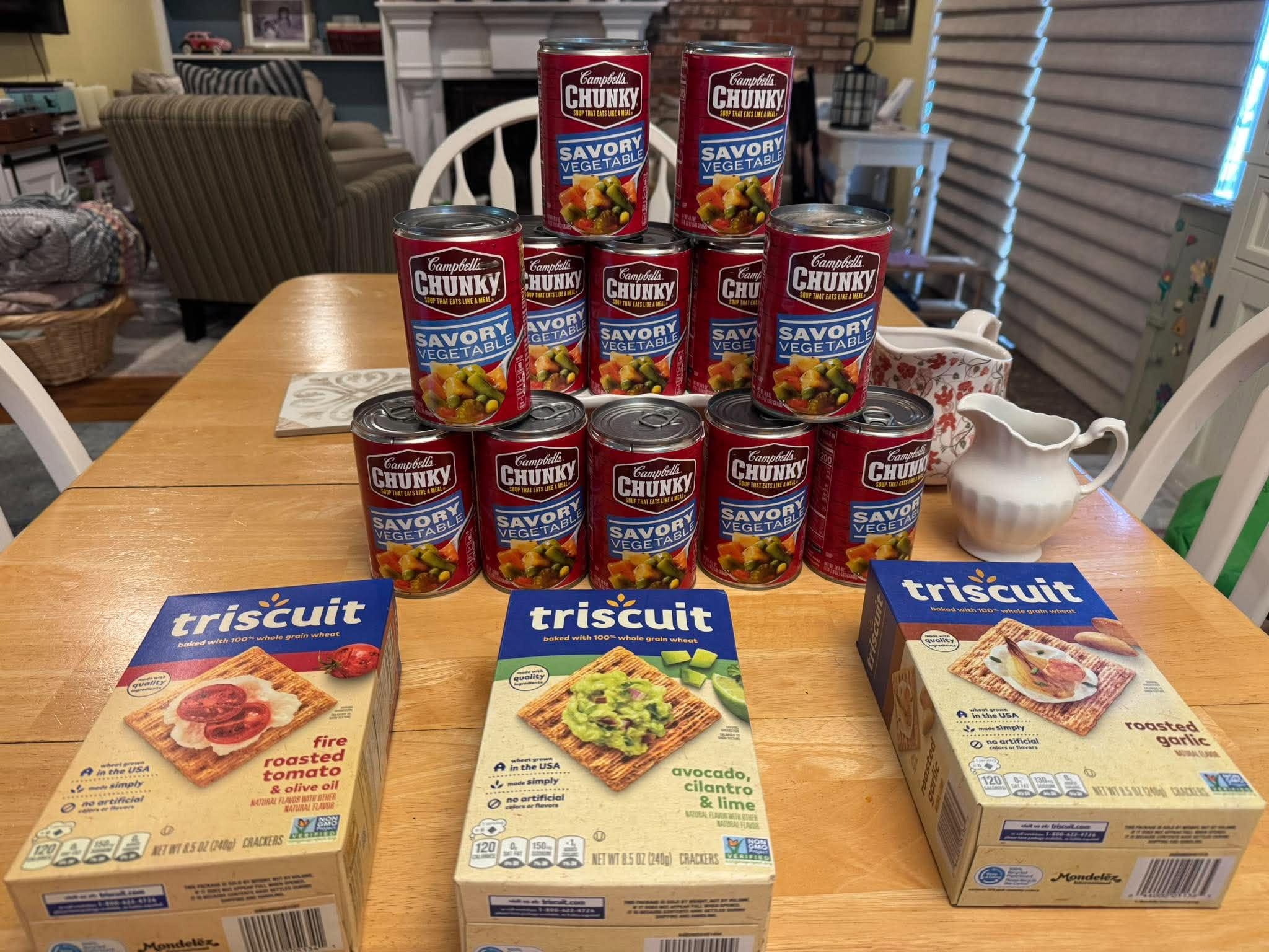 12 cans of Campbell's Chunky vegetable soup, two boxes of Triscuits and a box of WheatThins